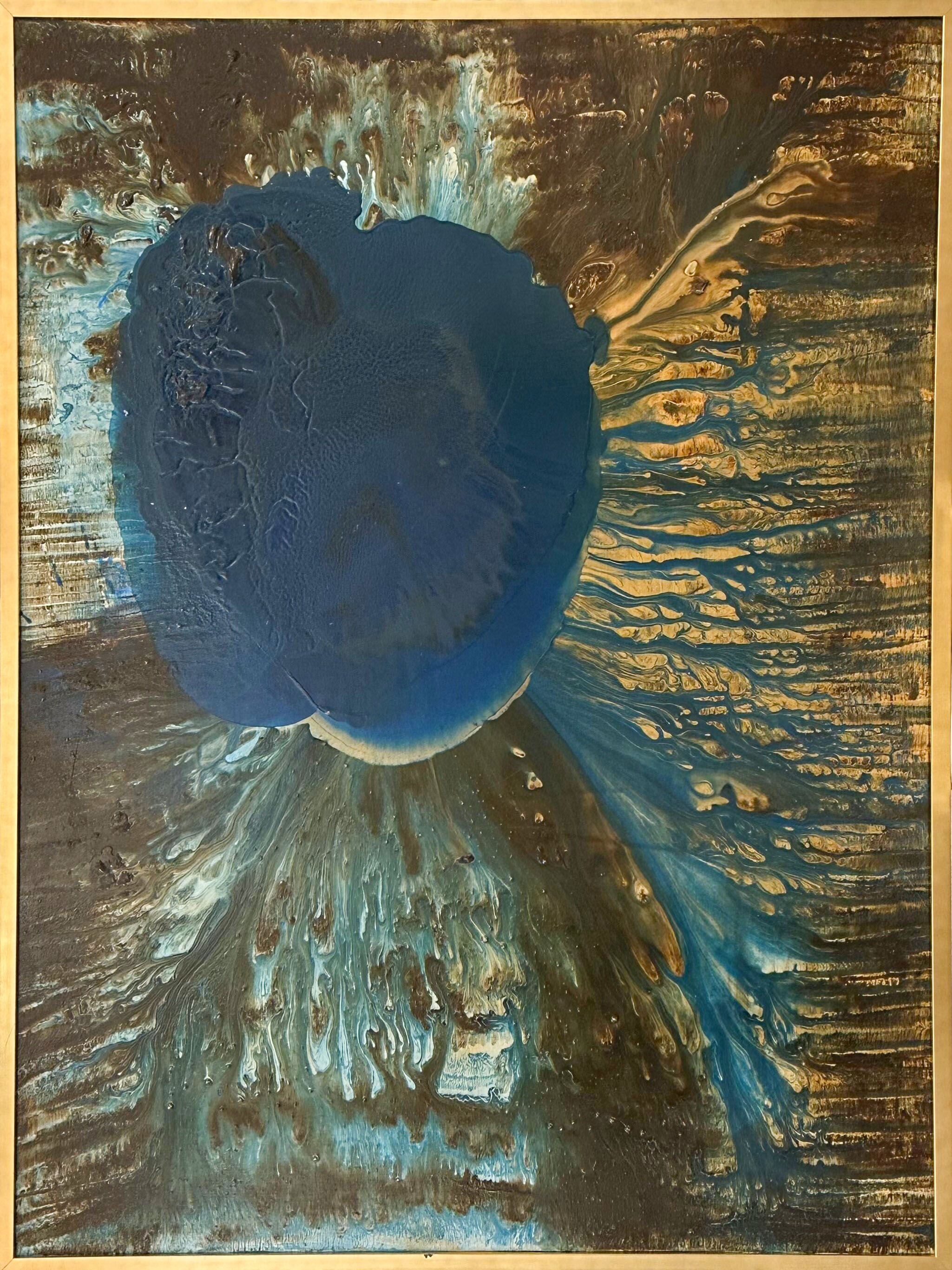 Title: The Beginning. Large abstract acrylic painting with a blue central form and flowing gold textures by G. Kim Hinkson.