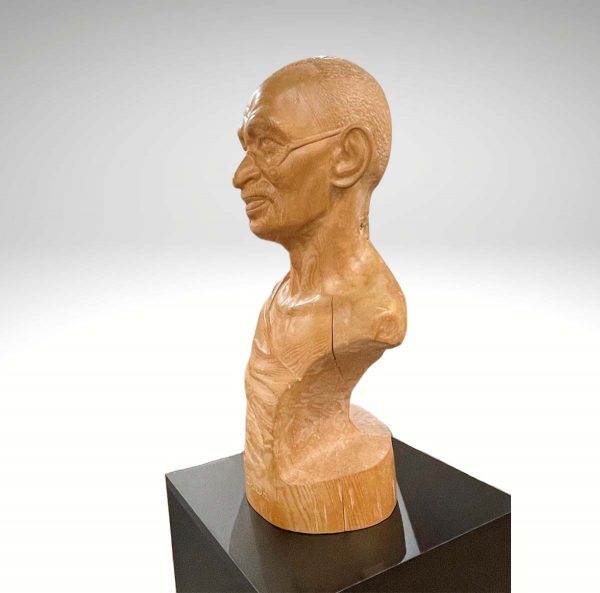 Contemporary Sculpture. Title: Mahatma Gandhi, Wood, White Cedar, 24 inches by Canadian artist Rudolf Sokolovski.