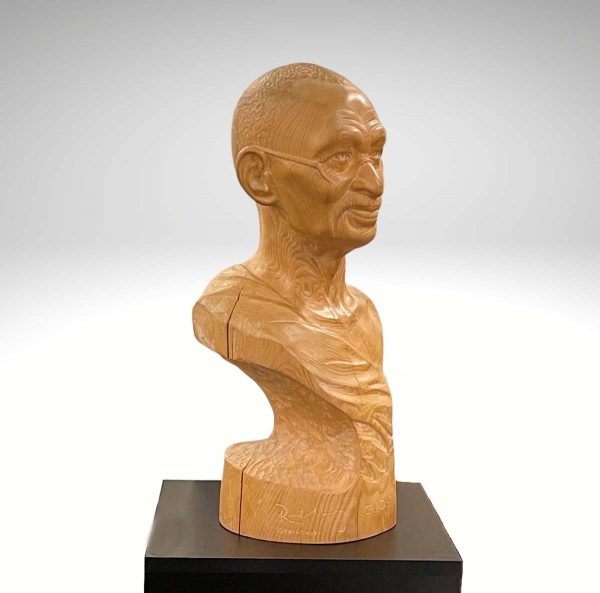 Contemporary Sculpture. Title: Mahatma Gandhi, Wood, White Cedar, 24 inches by Canadian artist Rudolf Sokolovski.