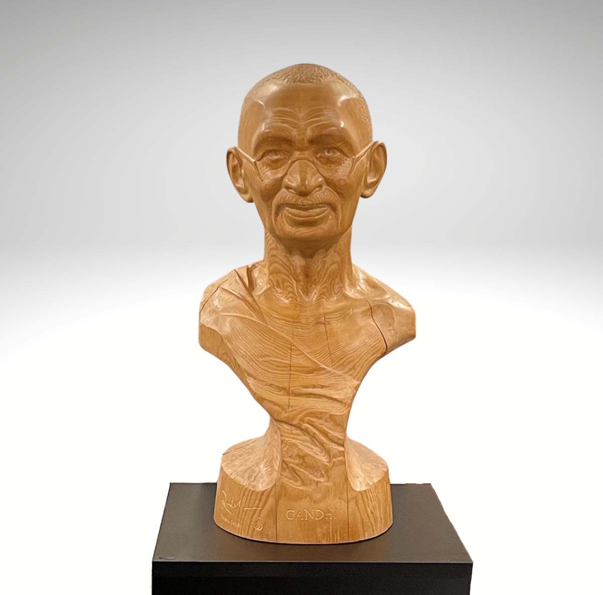 Contemporary Sculpture. Title: Mahatma Gandhi, Wood, White Cedar, 24 inches by Canadian artist Rudolf Sokolovski.