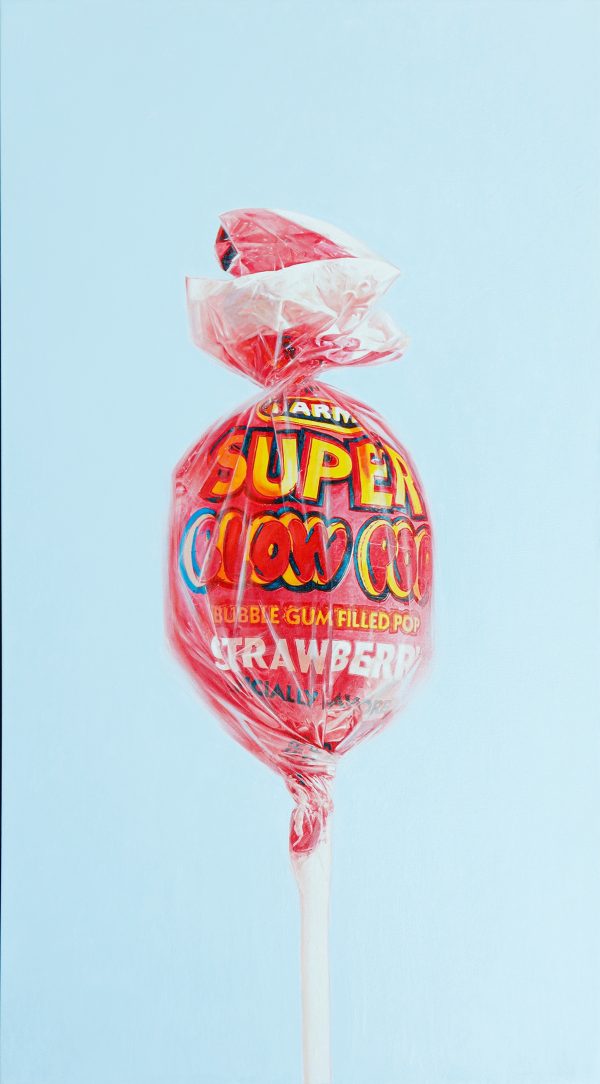 "Super Blow Pop" by Alexander Sheversky – 72x40 inch hyperrealist oil painting of a wrapped strawberry lollipop against a pale blue background.
