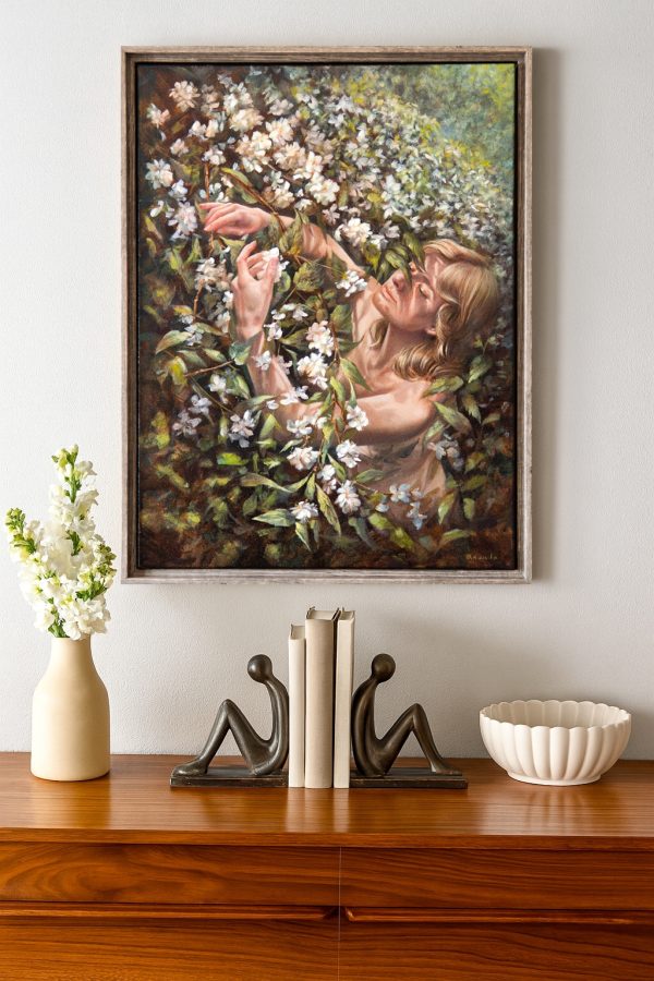 "Veiled Touch" by Ananda Dhama – 24x18 inch oil on canvas of a serene female figure immersed in white blossoms and green foliage, painted in natural light.