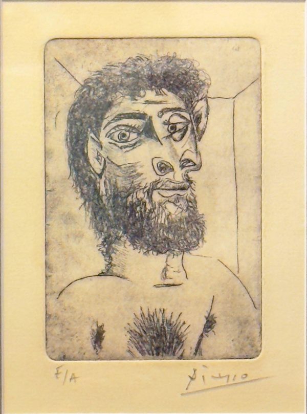 Pablo Picasso etching titled “Baylac Frédéric,” 7.5x5.5 inch, depicting a cubist male bust with intense gaze and beard, black ink on paper.