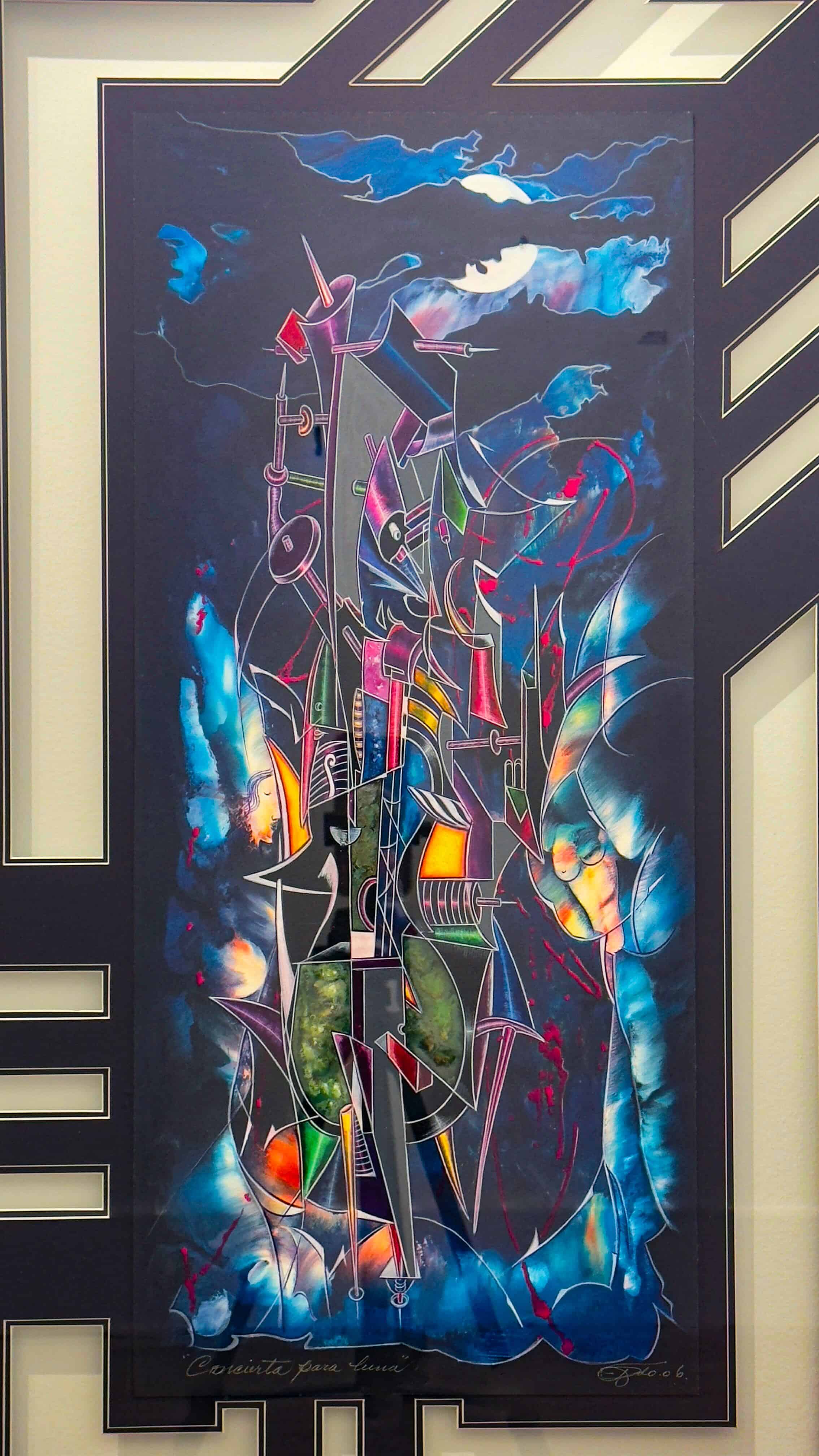 Framed multi-media artwork “Concierto Para Luna” by Juan Quevedo featuring Cubist forms, vivid colors, and a moonlit sky.