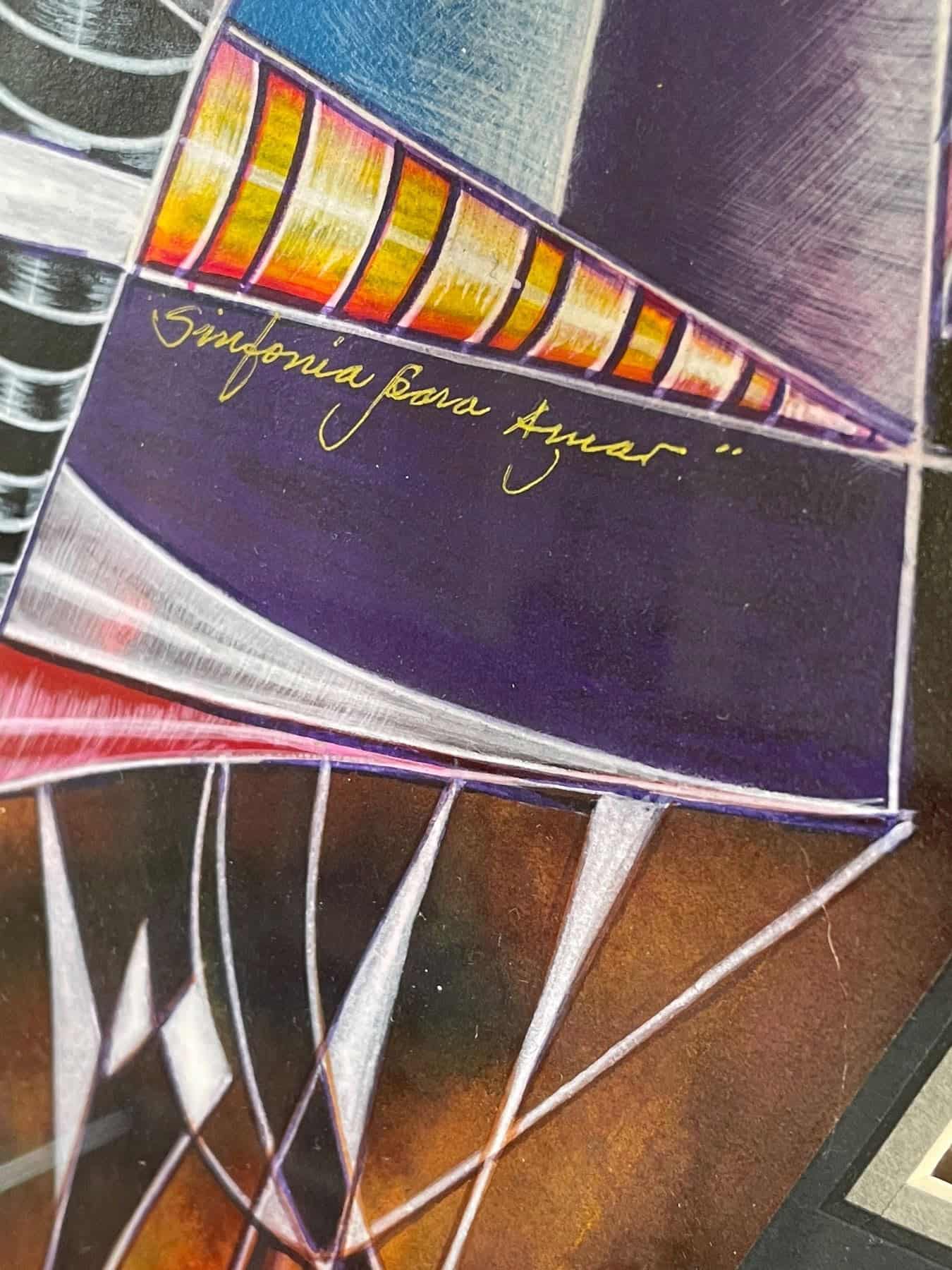 Framed mixed-media watercolor artwork “Sinfonía Para Amor” by Juan Quevedo, featuring geometric abstract forms and vivid colors in a triangular composition.